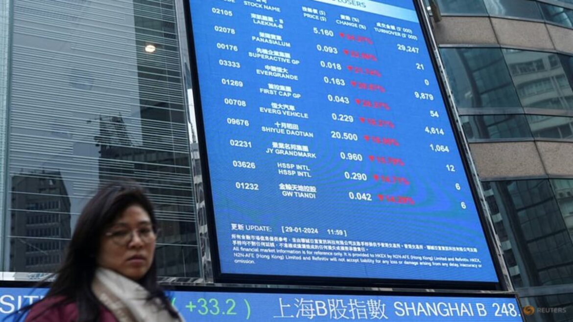 Tech pulls down Asia stocks, dollar gains on inflation data