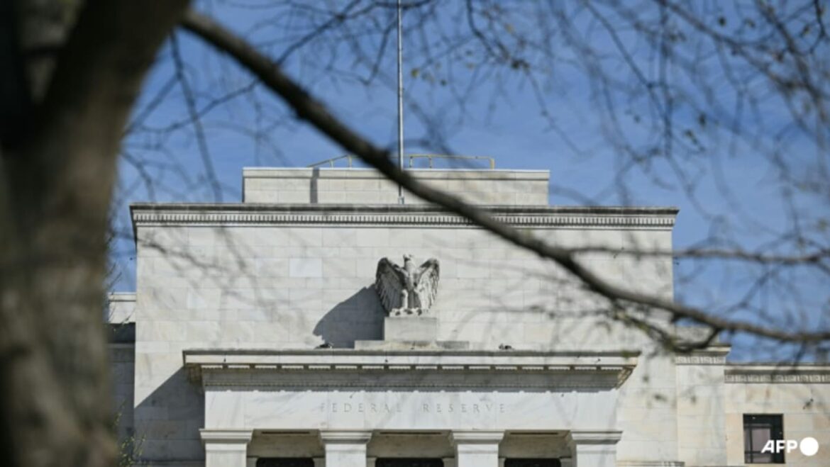US Federal Reserve holds key rate, pencils in 3 cuts this year