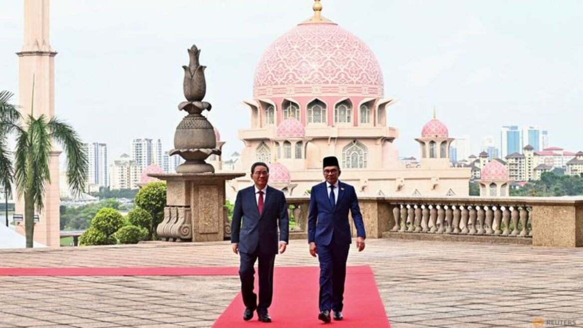 Malaysia, China mark 50 years of ties with deals on development, durians