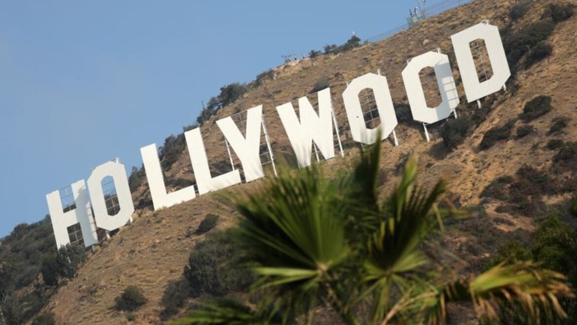 Hollywood workers union reaches pay, AI-use deal with top studios