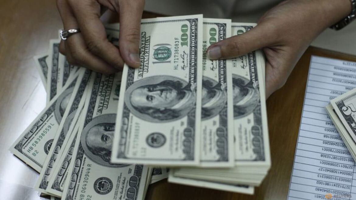 Dollar treads water after tame US inflation report, yen rally stalls
